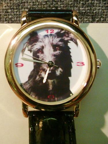 Beautiful New Lurcher Watch.<br><br> 38mm gold coloured case, gold hands, battery operated, 7inch black band, stainless steel case-back.