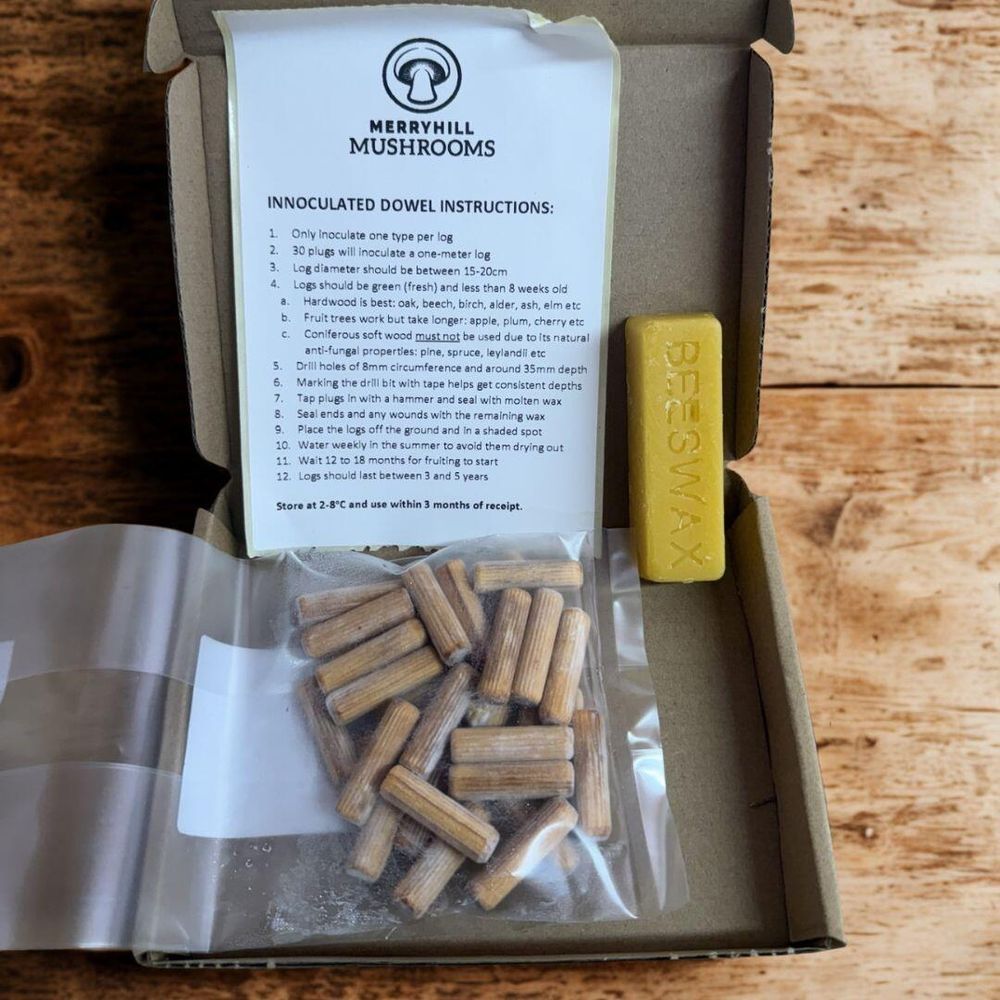 Contents of Outdoor Log Growing Kit showing dowels