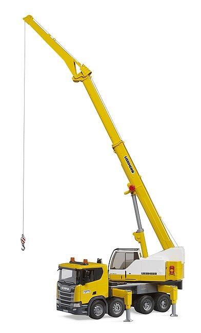 Toy crane truck with boom raised vertically and hook hanging from the winch