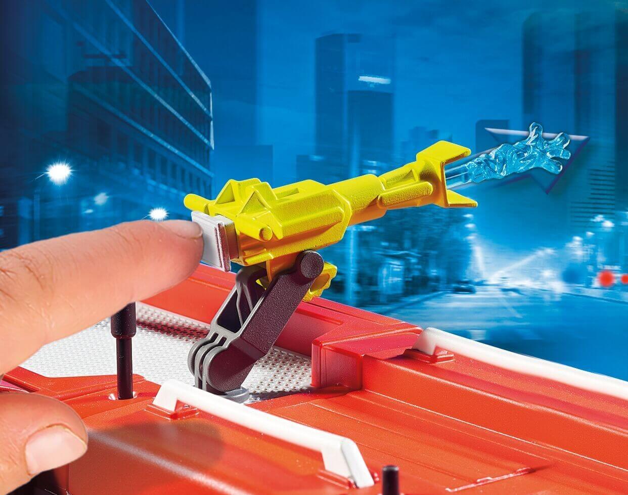 Close-up of Playmobil fire engine roof-mounted water cannon being activated