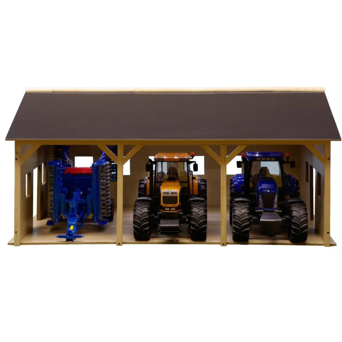 Kids Globe wooden farm shed for 1:16 scale tractors - close up internal front view, with vehicles inside.