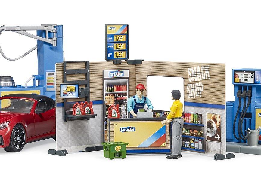 Bruder Petrol Station and Car Wash full setup with pumps, tools, and vehicle service area.