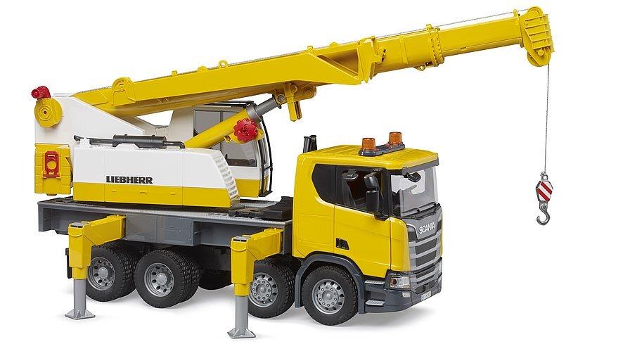 Crane truck with stabiliser legs extended and boom rotated to the left side
