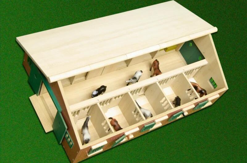 Kids Globe horse stable at 1:32 scale with the roof lifted to show the interior stalls and horse figures.