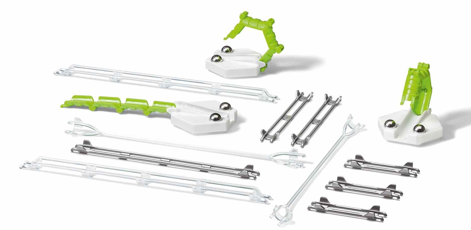 Close-up of GraviTrax Bridges Pack components including adjustable bridges, tracks, and support pieces