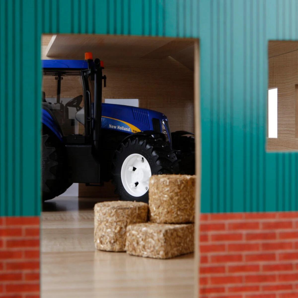 Kids Globe wooden farm shed for 1:16 scale tractors - view internally through pedestrian door.