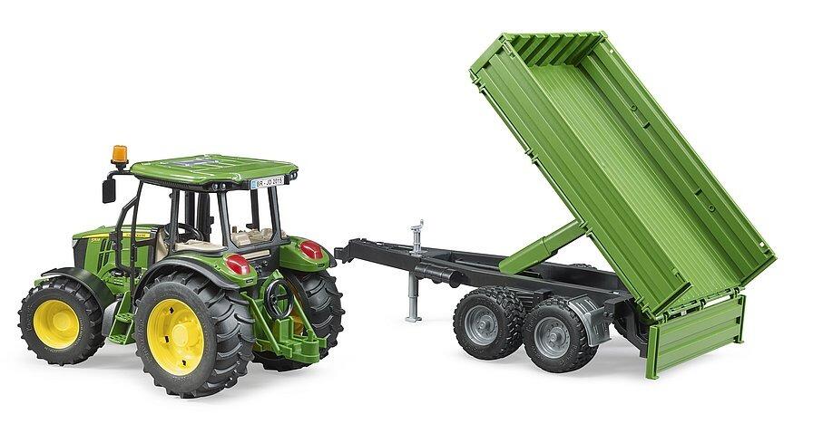 Bruder John Deere 5115M tractor with tipping trailer raised for unloading