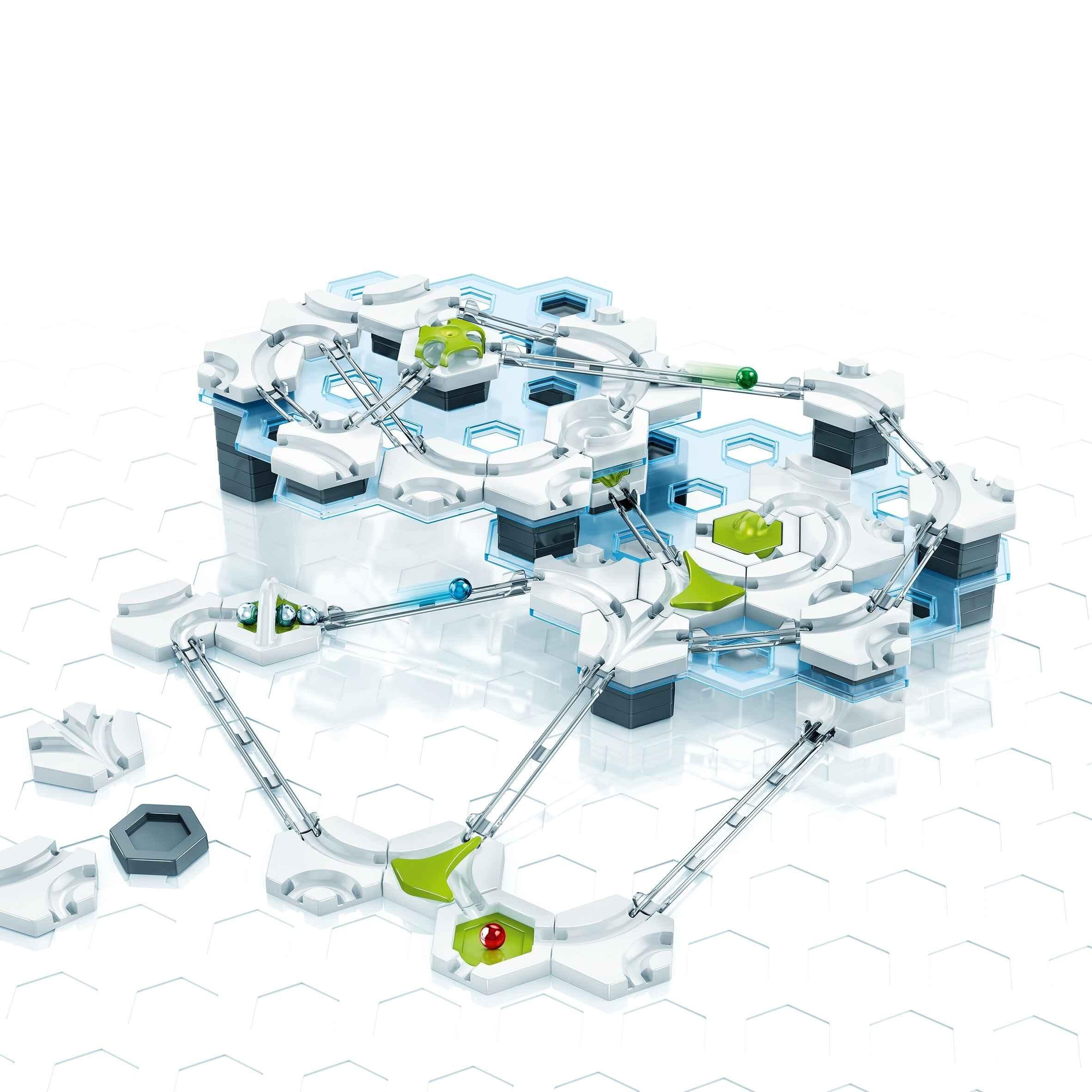 Close-up of GraviTrax marble run track layout with curves, tiles, and action pieces