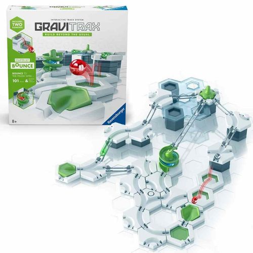 GraviTrax Starter Set Bounce box displayed beside a completed marble run layout with trampolines and green action elements