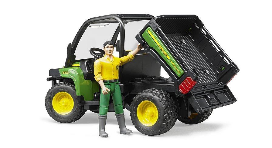 Rear angle of the Bruder John Deere Gator XUV 855D with driver figure and the tipping cargo bed raised