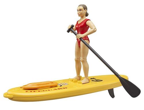Bruder lifeguard figure standing with yellow stand-up paddle board and black paddle.