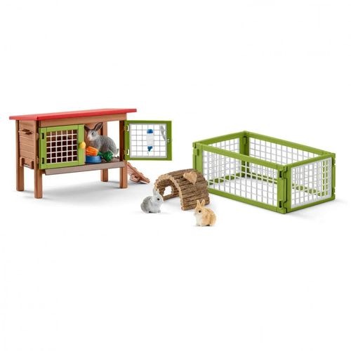 Schleich Rabbit Hutch set with hutch, fenced run, rabbits and accessories arranged together.