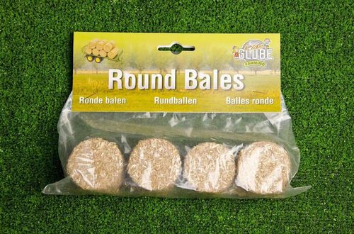 4 round hay bales in packaging