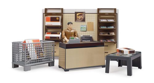 Bruder UPS Store playset with counter, shelving, and UPS worker figure.