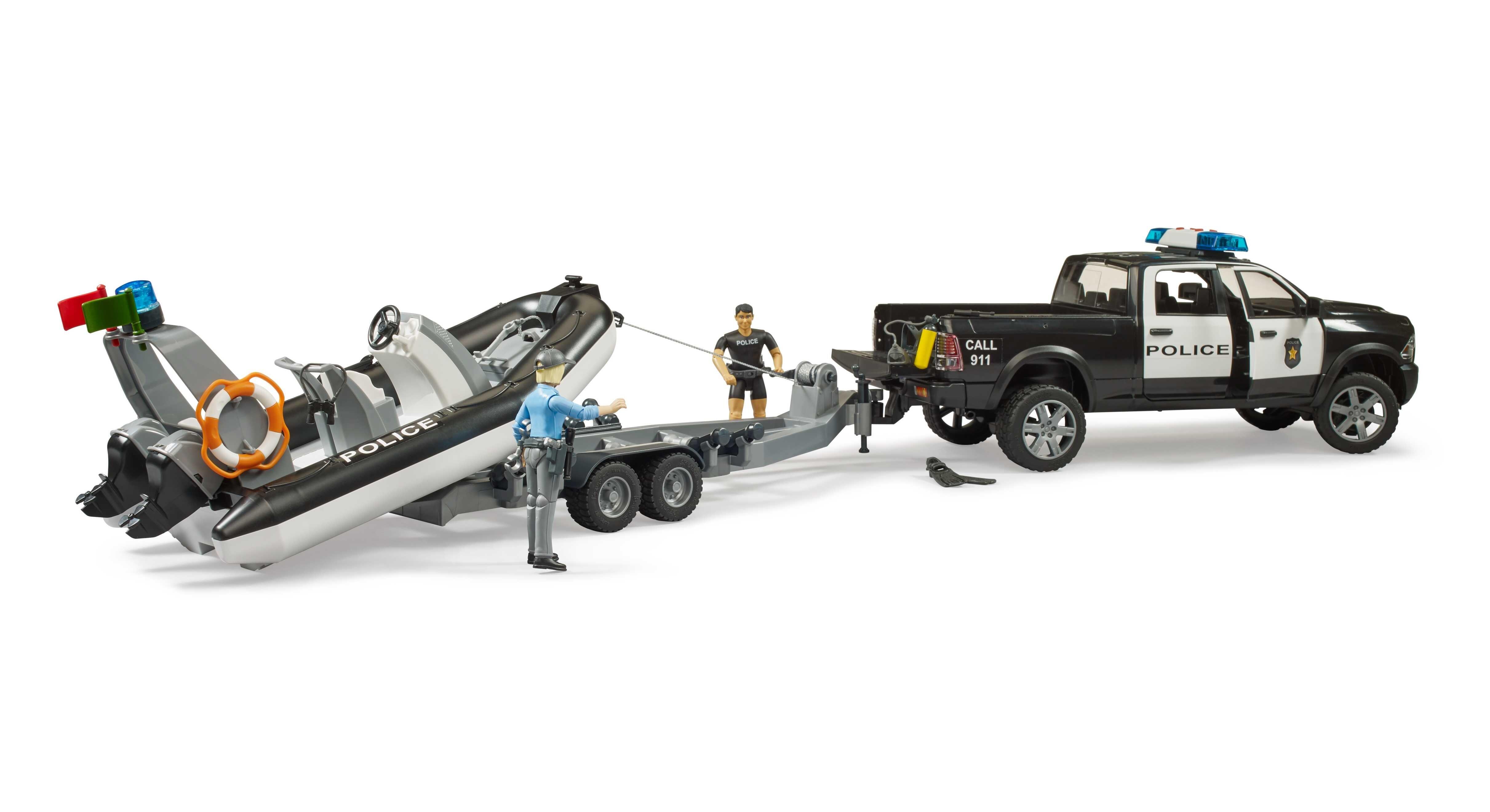 Bruder police pickup with trailer lowering the rescue boat, includes police figures and accessories