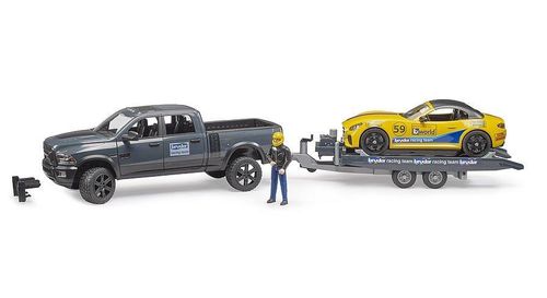 Bruder RAM 2500 Power Wagon towing yellow Bruder roadster on racing trailer toy