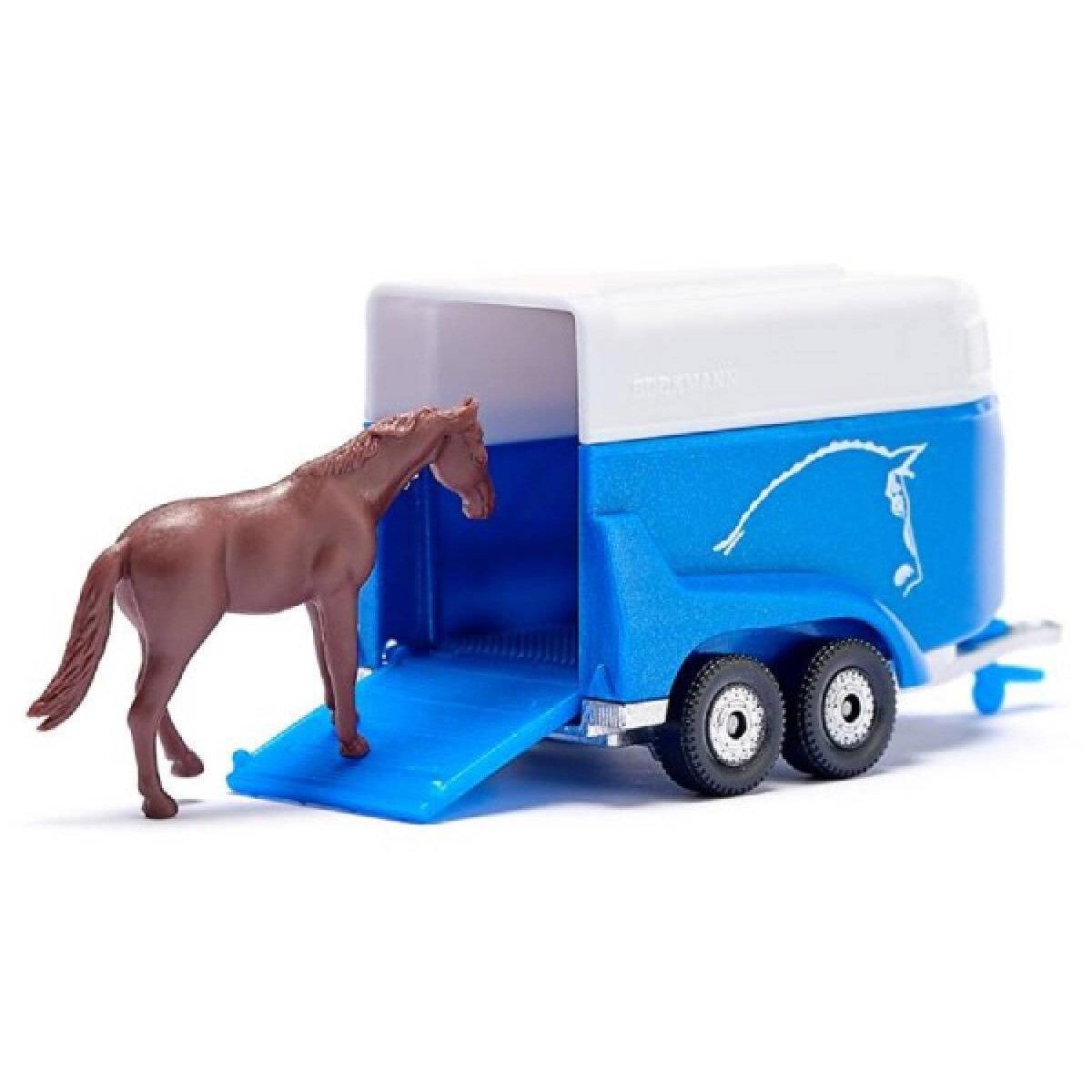 Toy horse walking up the loading ramp of the Siku horse trailer