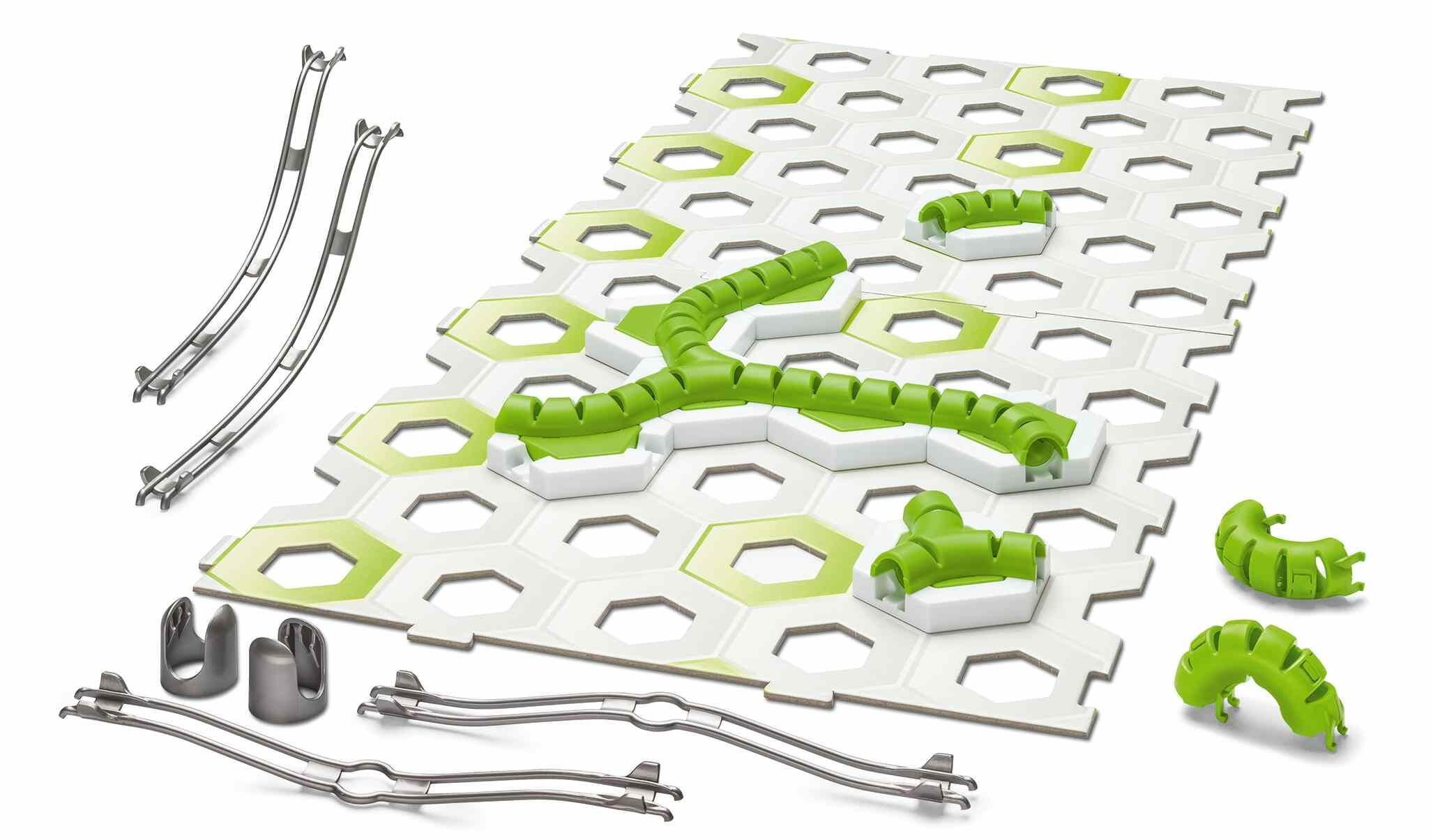 Close-up of GraviTrax Tunnel Pack components including green tunnels, hidden tracks, and connectors