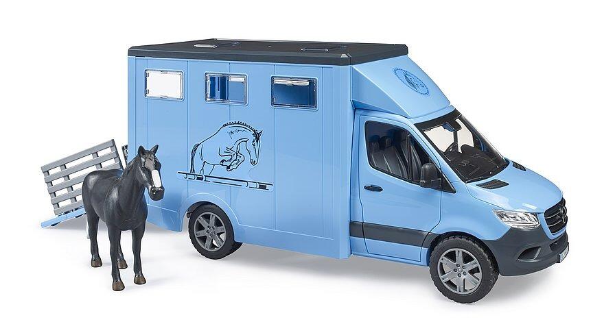 Side view of Bruder Mercedes-Benz Sprinter Animal Transporter with fold-out ramp and cow