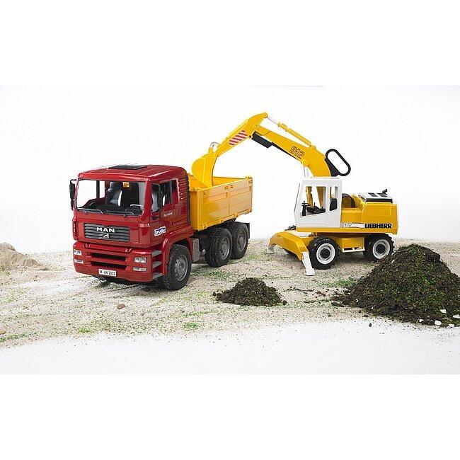 Bruder Liebherr Excavator loading dirt into red truck – 1:16 construction toy scene for kids