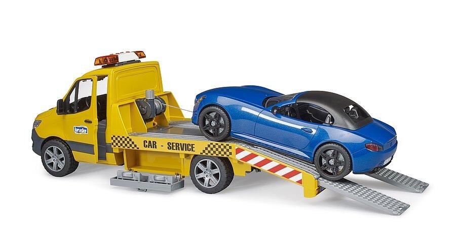 Side view of the Sprinter transporter toy lowering the ramp for the blue roadster.