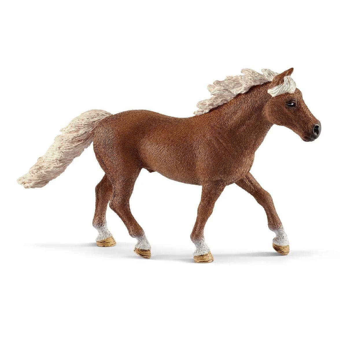 Schleich brown pony figure included in the Pony Agility Training set.
