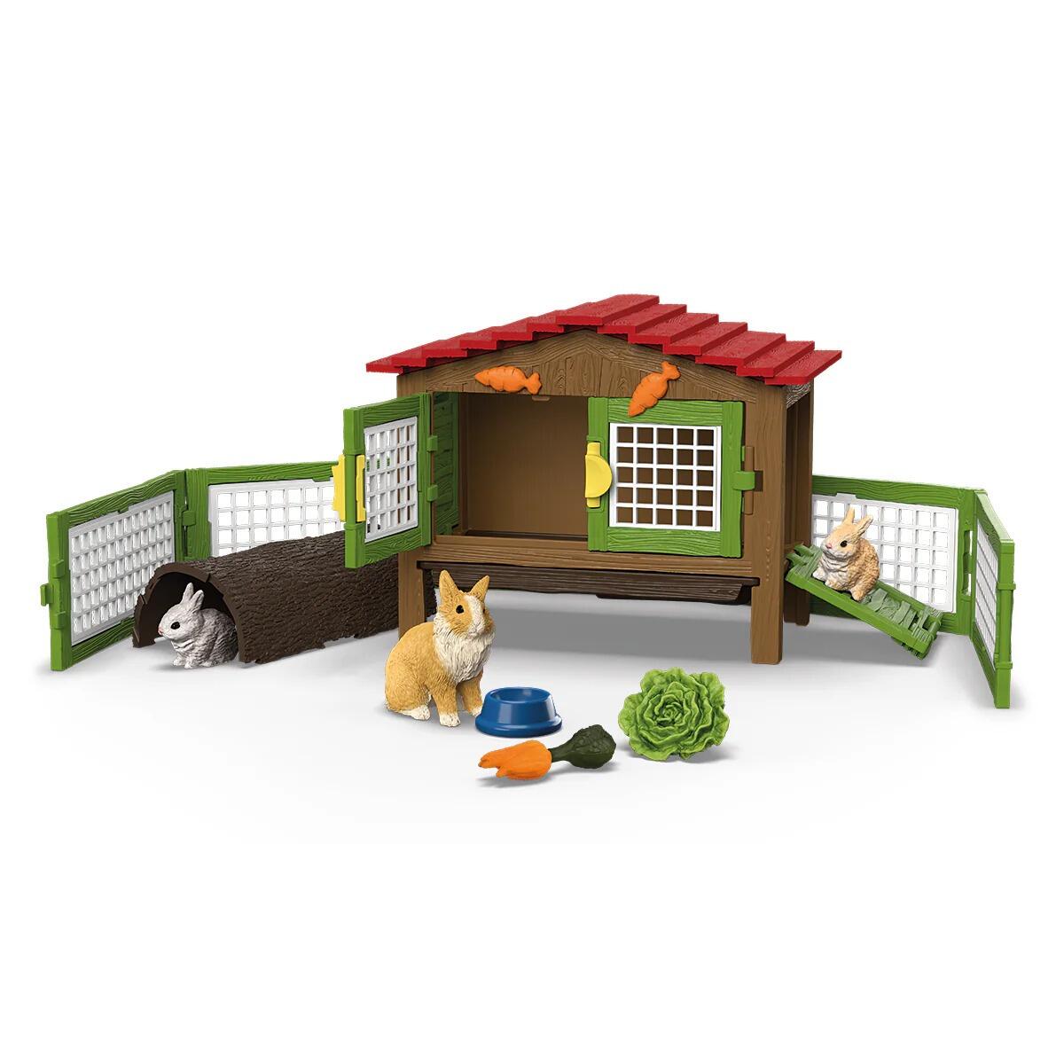 Schleich Rabbit Hutch with 3 Rabbits set showing hutch with red roof, fenced run and rabbit figures with accessories.