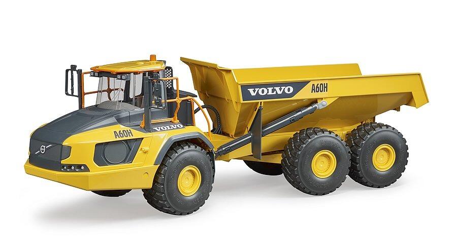 Volvo A60H dumper truck toy with articulated chassis on white background