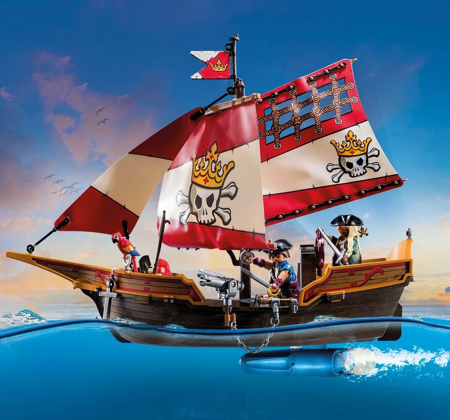 PLAYMOBIL 71418 Pirate Ship sailing on the ocean with black sails and pirate crew