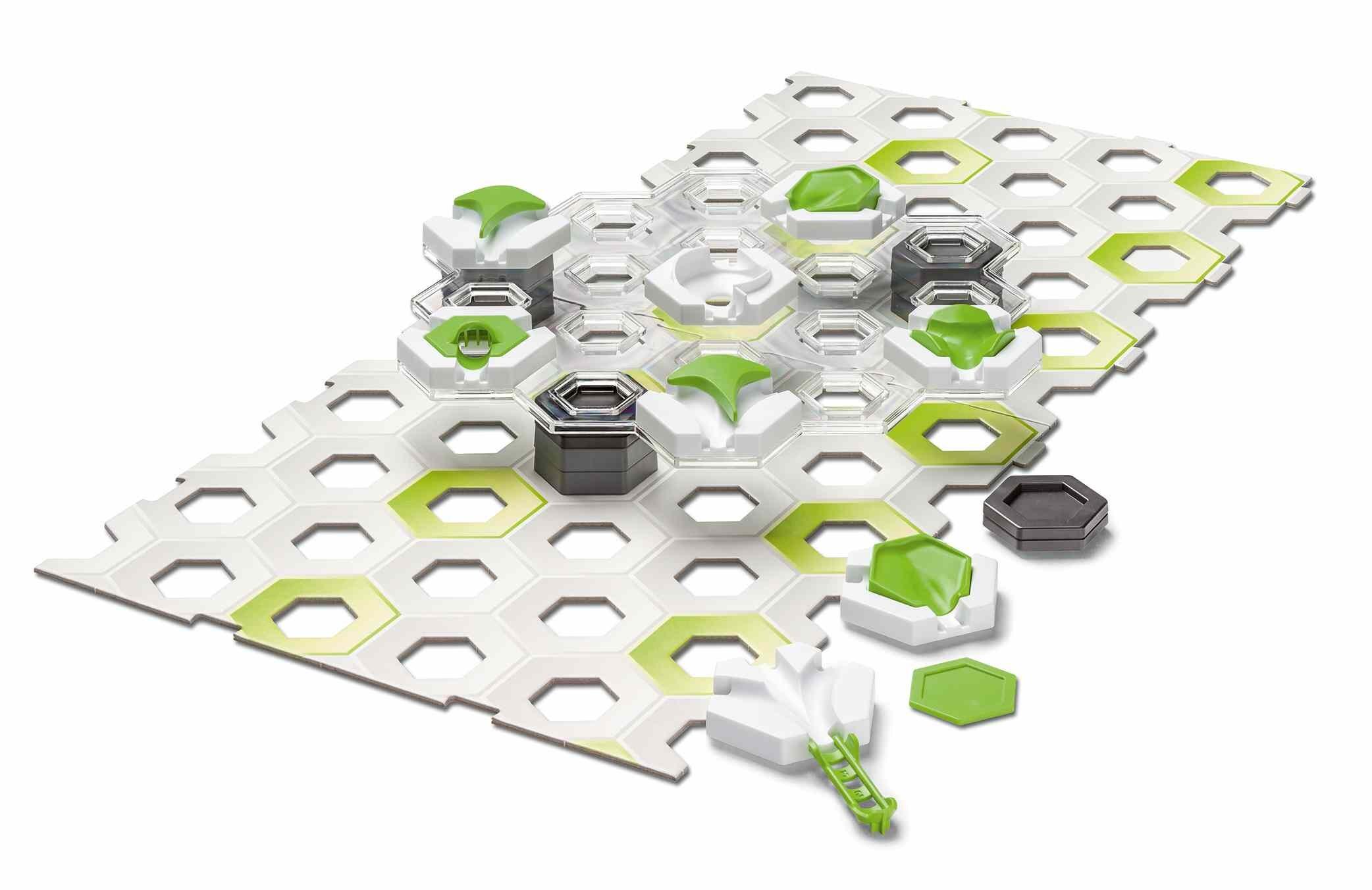 Close-up of GraviTrax Building Pack pieces including tiles, pathways, and connectors