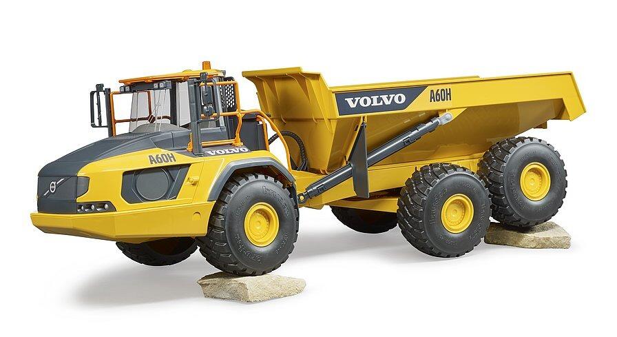 Front three-quarter view of Volvo A60H dumper truck toy on white background