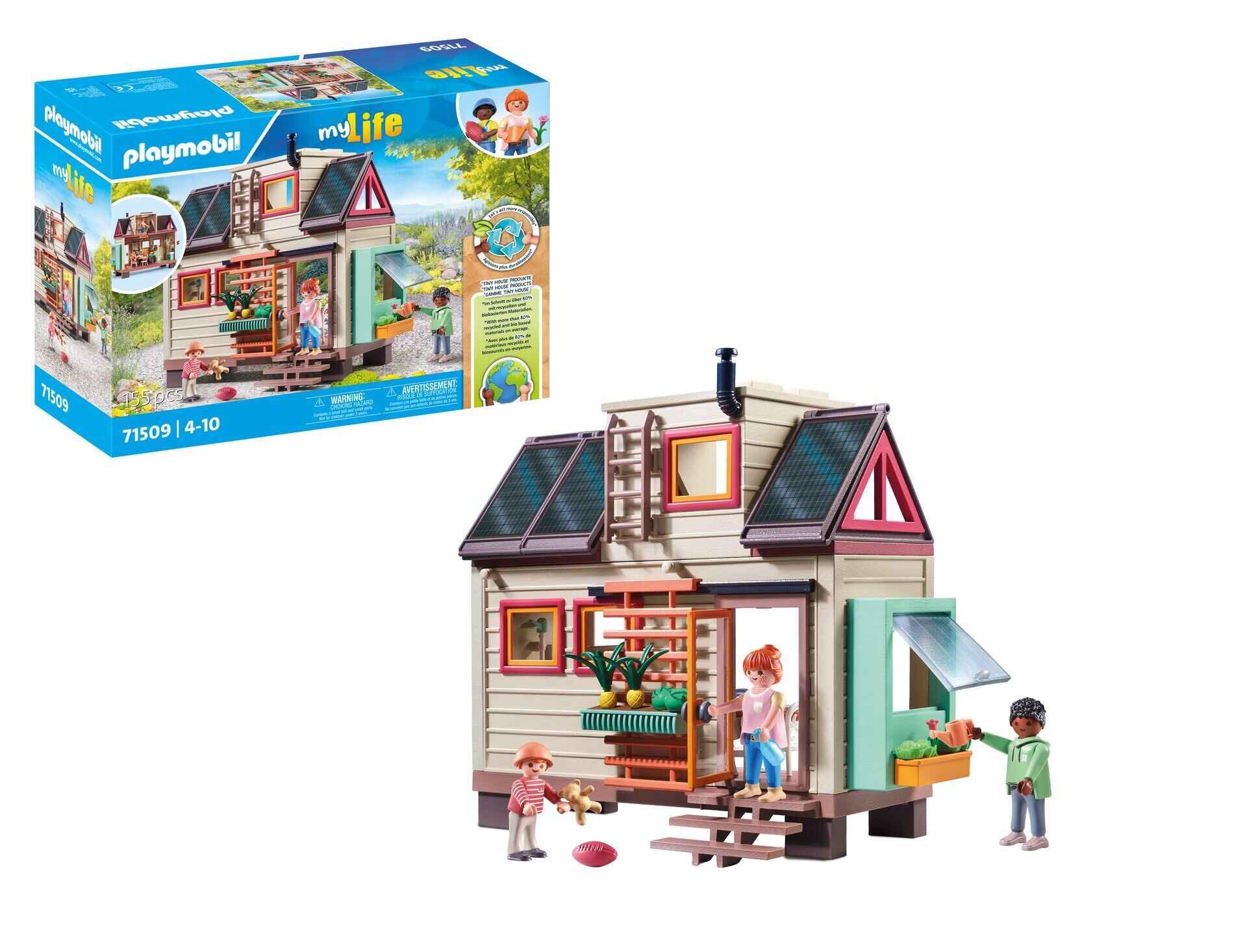 PLAYMOBIL 71509 Tiny House showing the mobile home, figures, and accessories included in the set.