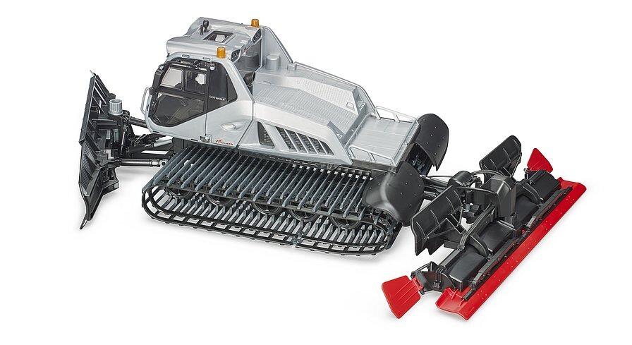Front angled view of Bruder Prinoth Leitwolf snow groomer showing adjustable front blade