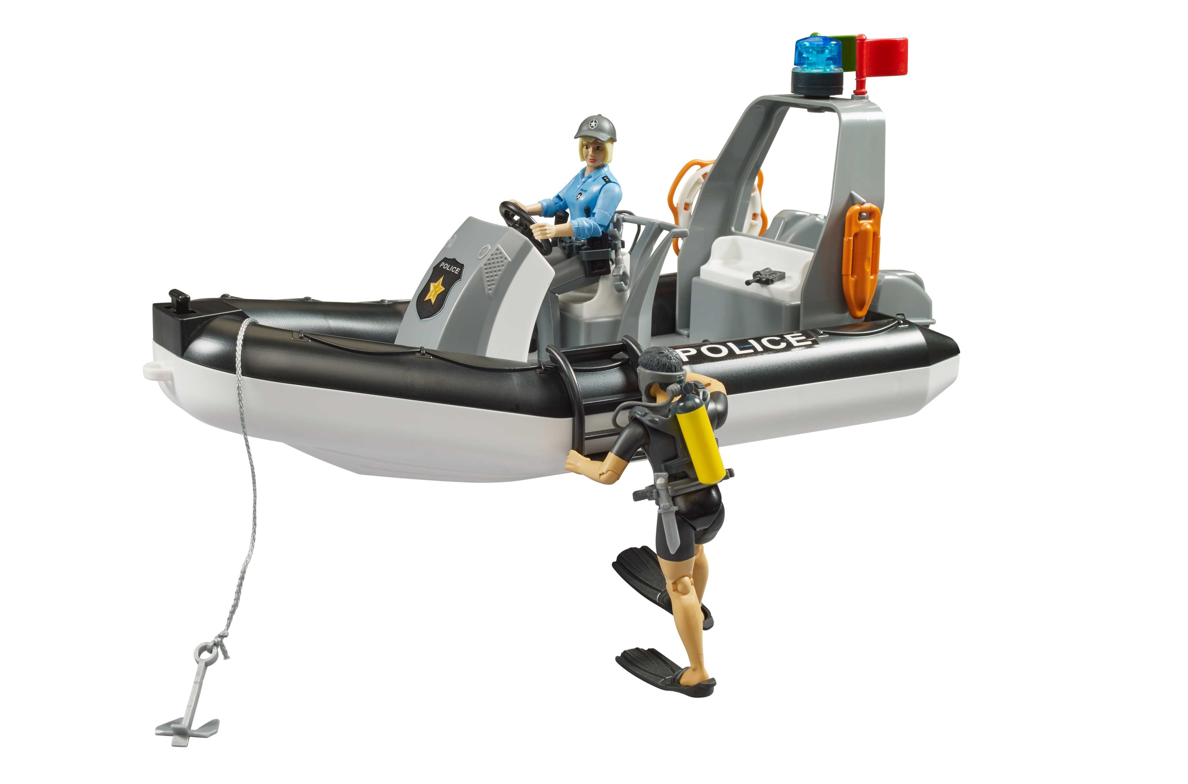 Police rescue boat toy with diver figure climbing aboard and rope accessory attached