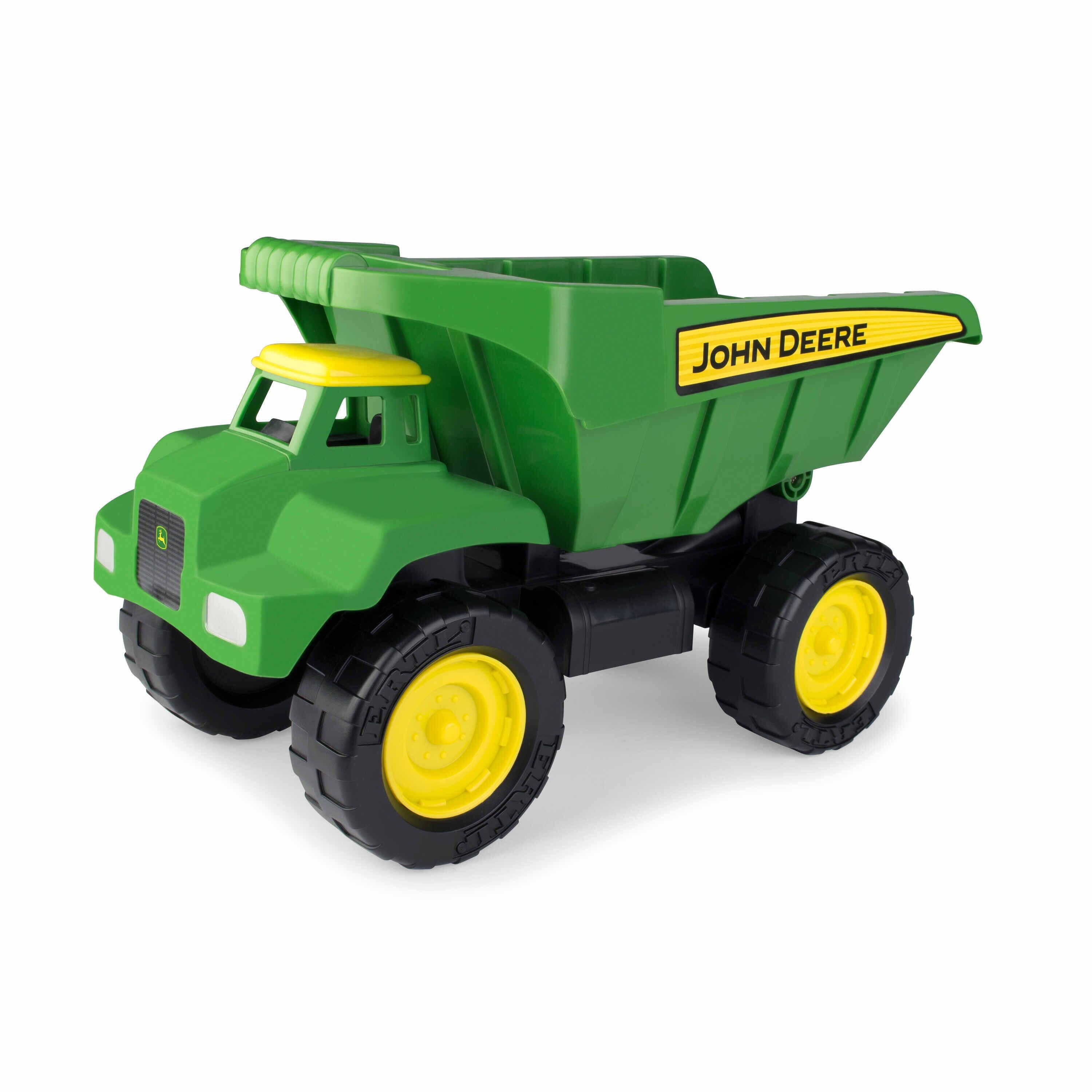 Front side view of John Deere Big Scoop dump truck toy in green and yellow on a white background.