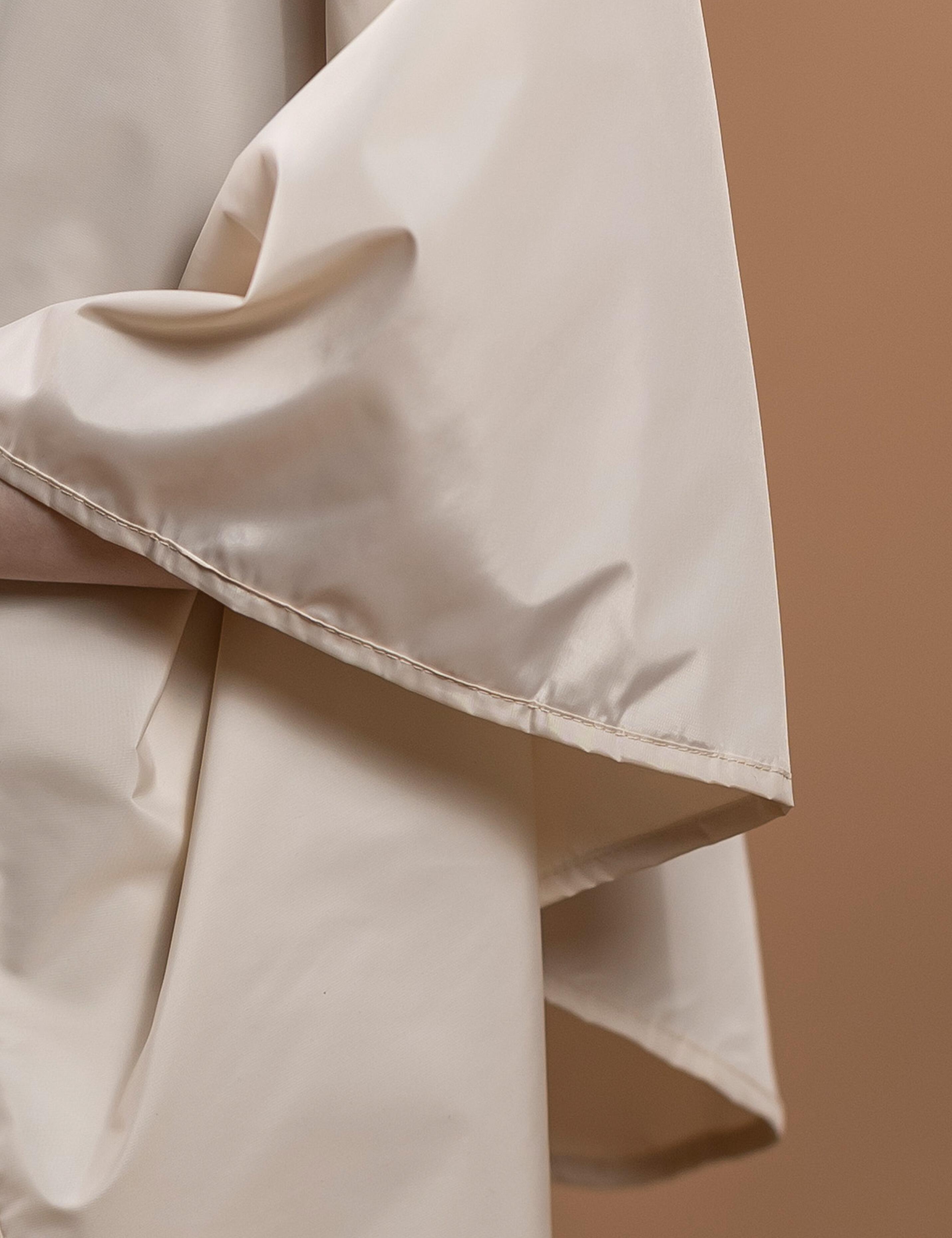 Cream toned child size styling cape for commercial personalization
