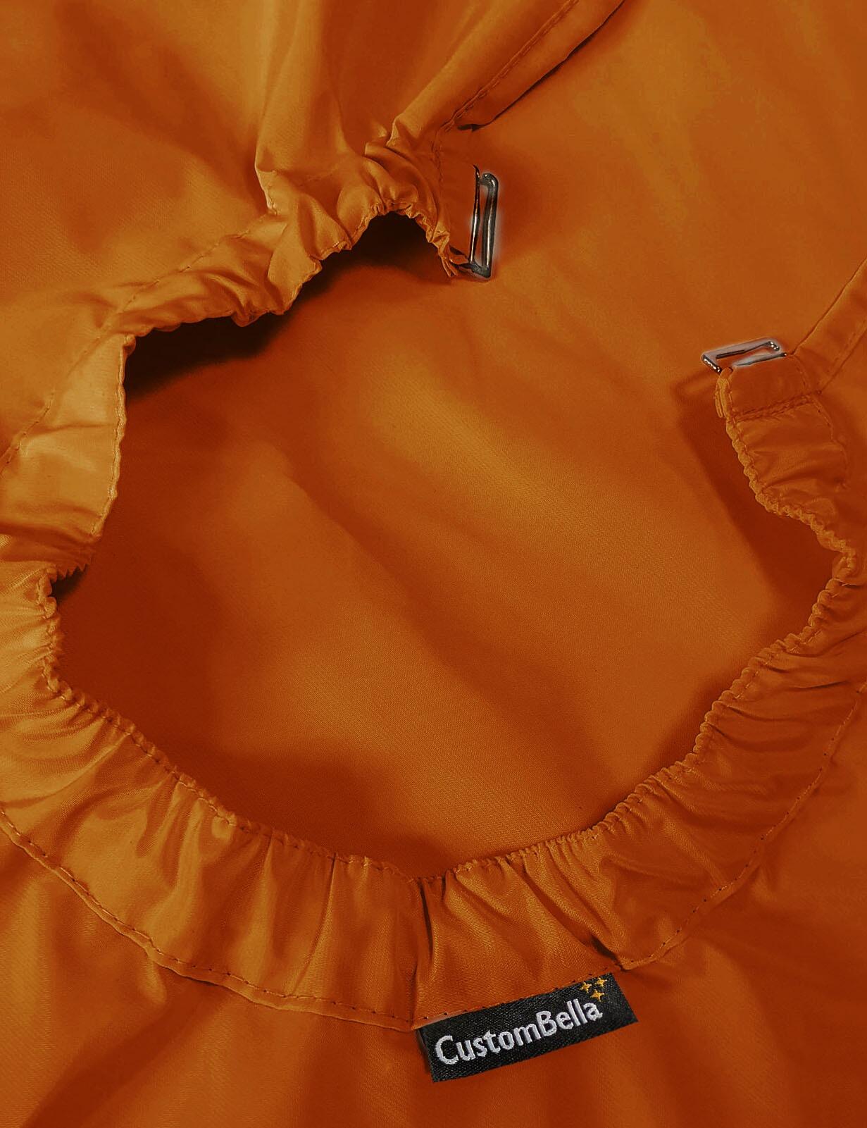 Ginger biscuit salon cape with hand slits and secure clip closure