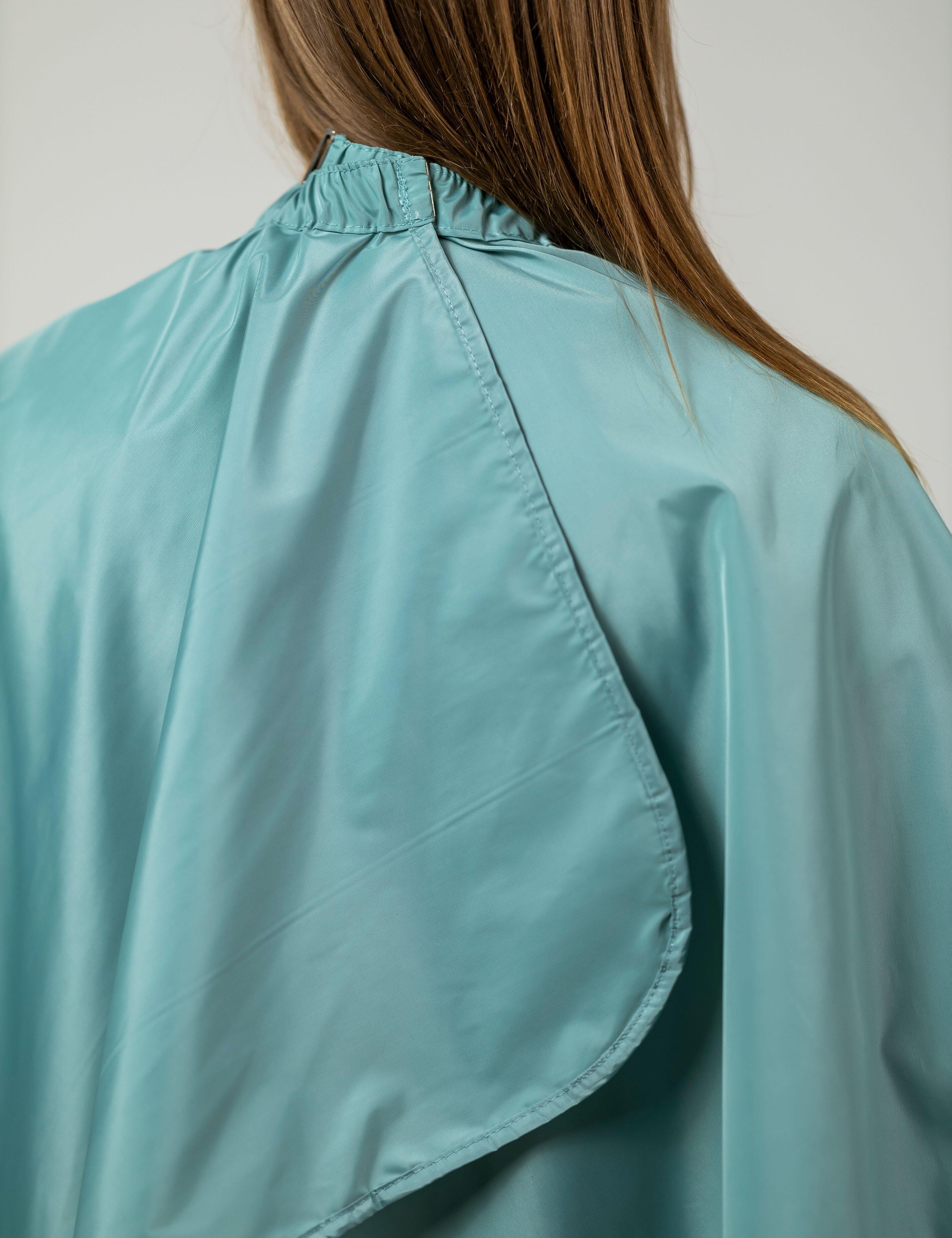 Stain-resistant sage barber gown built for everyday commercial hair treatments