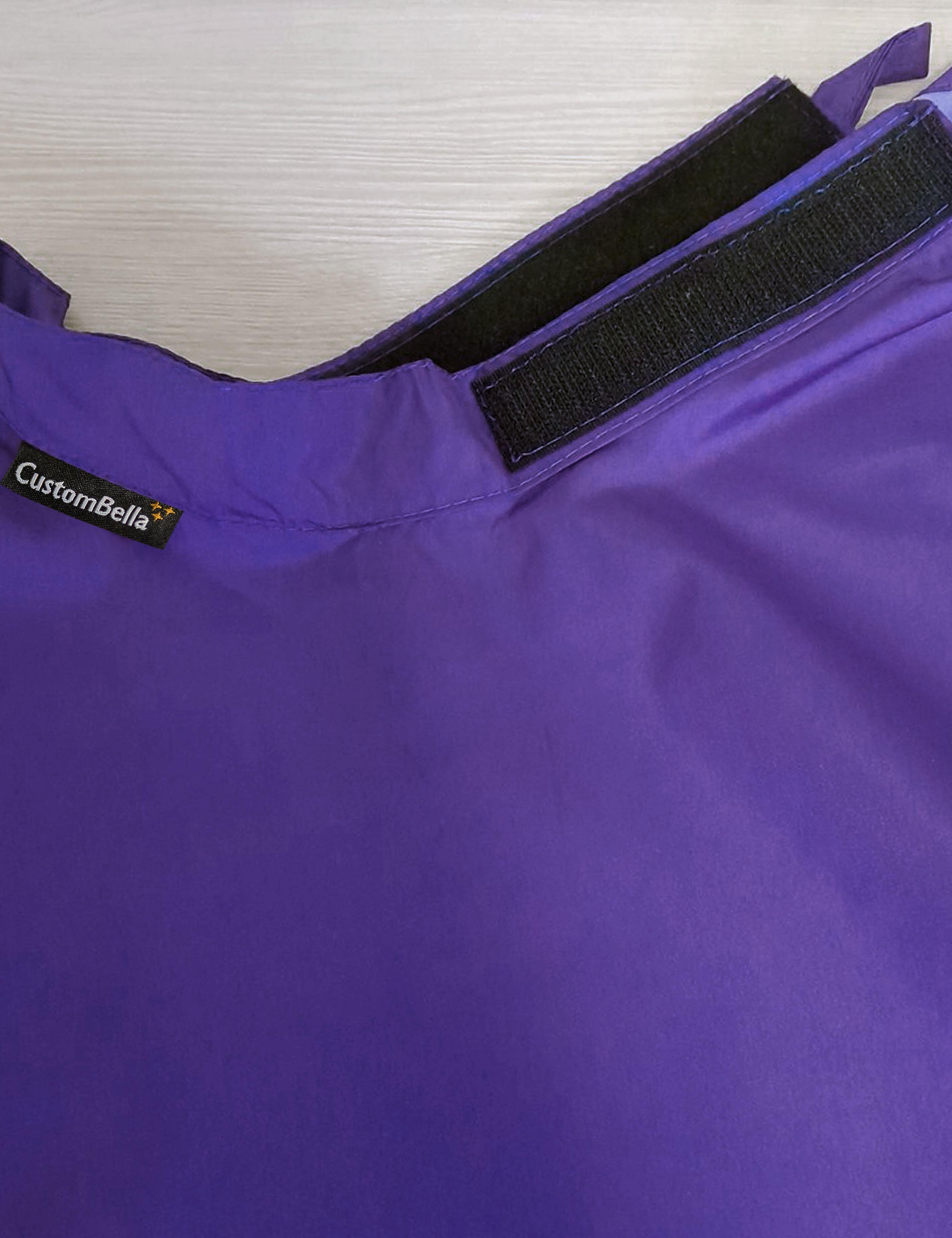 Purple kids salon cape with an adjustable velcro neck closure