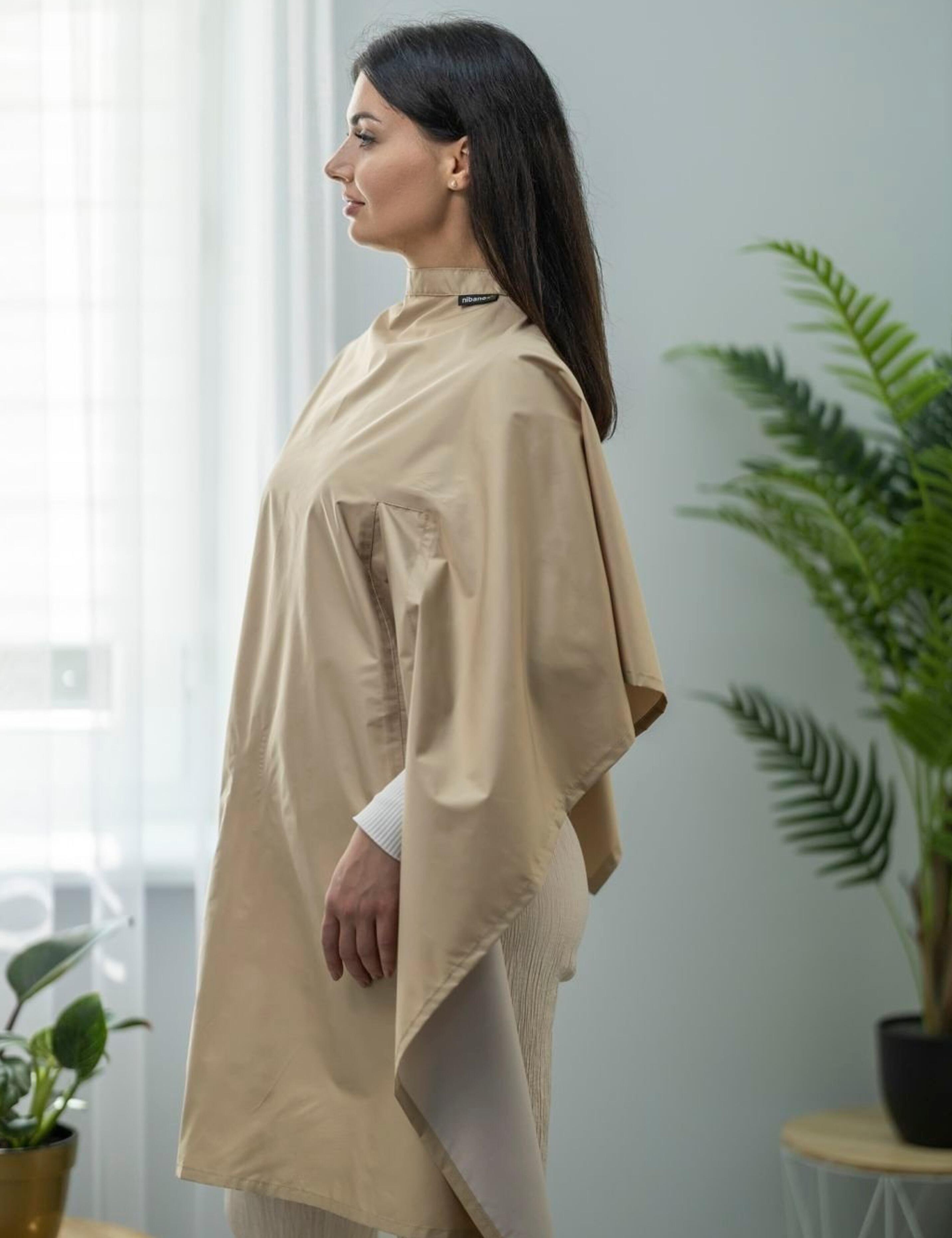 Stylish cappuccino salon gown with slits for client hands