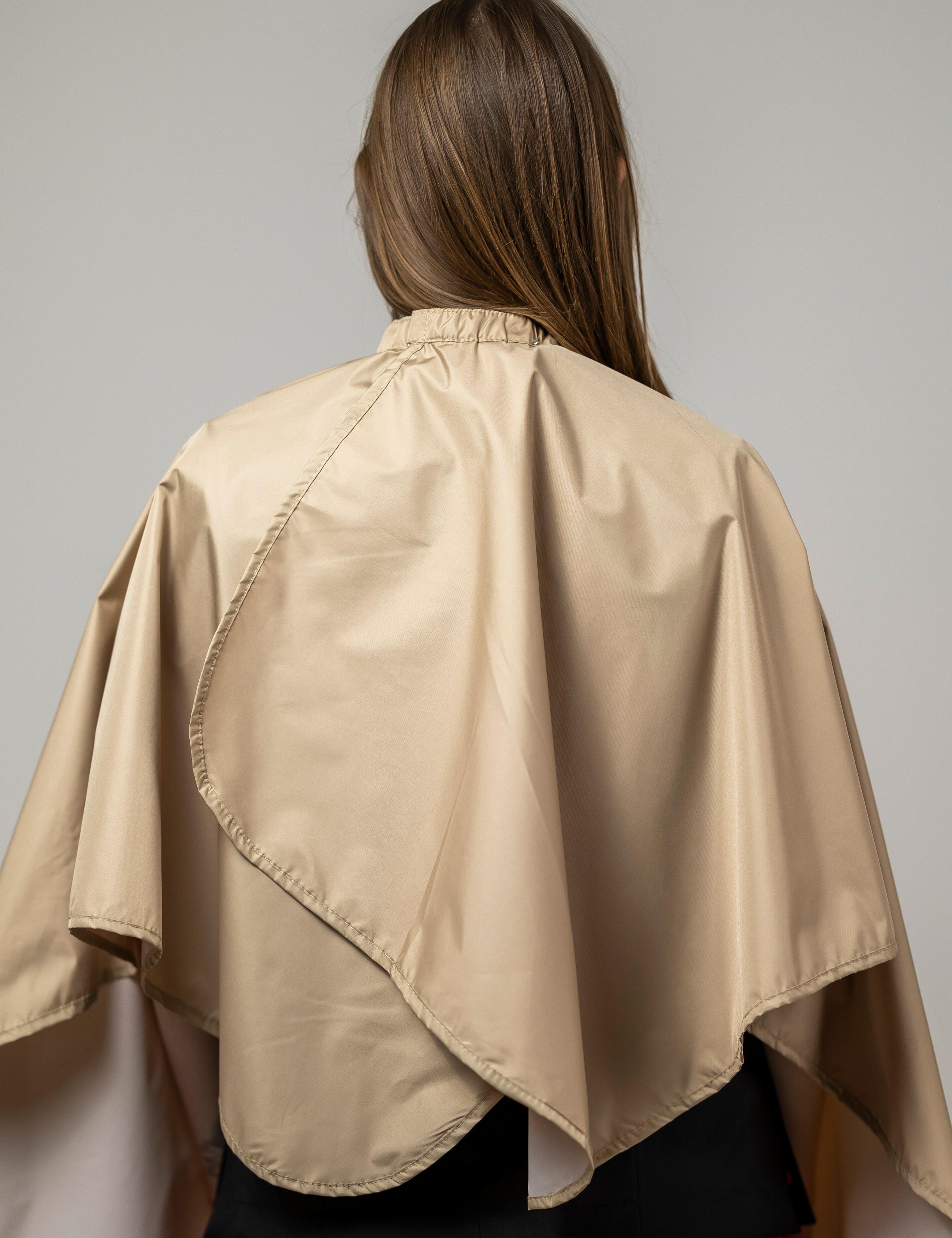 Stain-resistant cappuccino barber gown to keep clients safe and dry