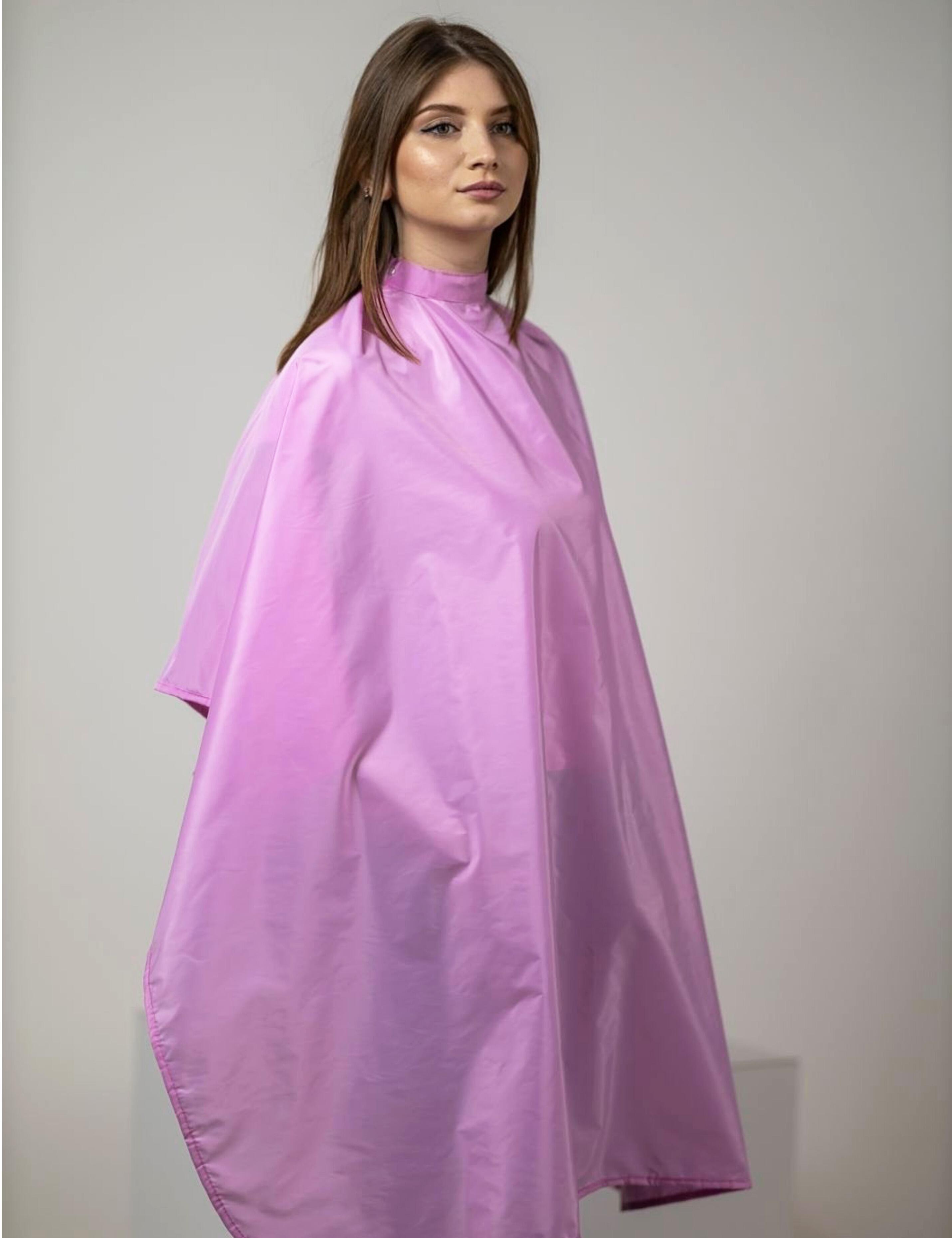 Premium pink hair cutting cape available with fast shipping in the USA.