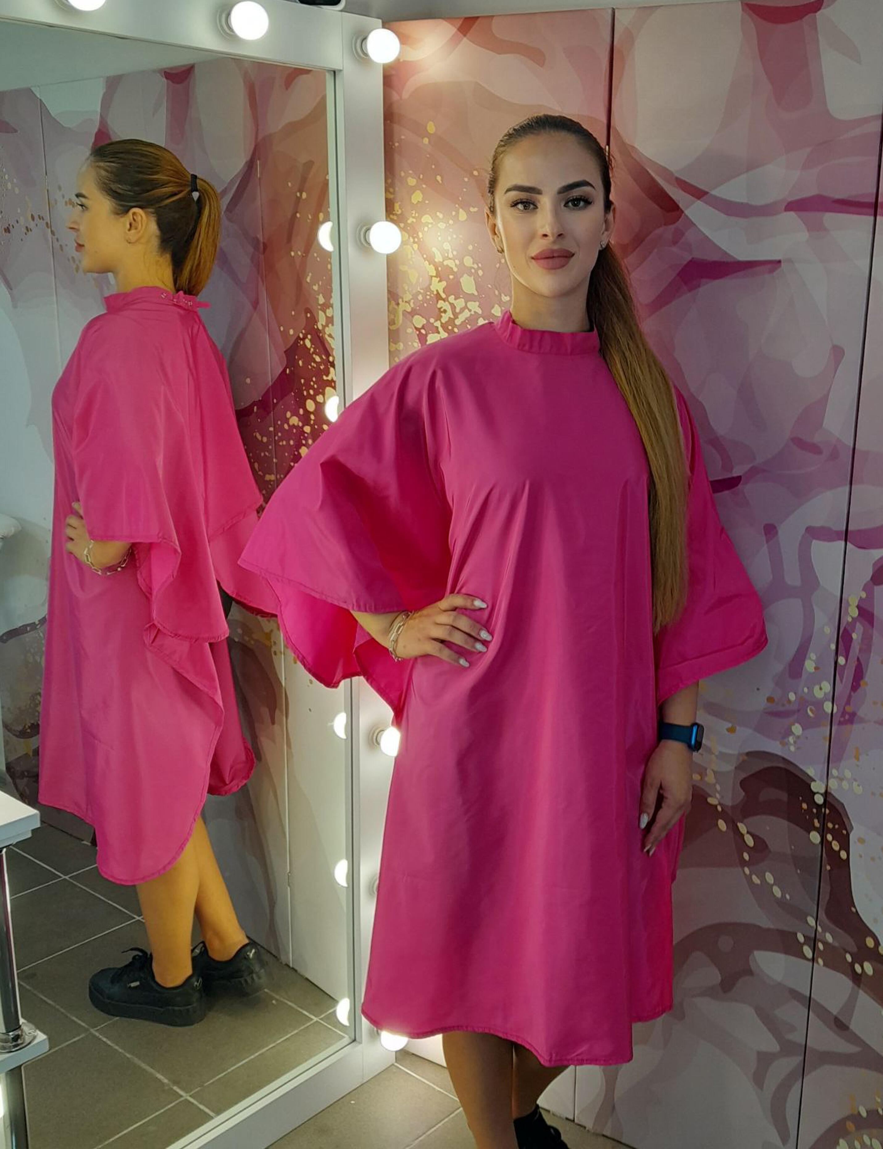Premium hot pink hair cutting cape available with fast shipping in the USA.
