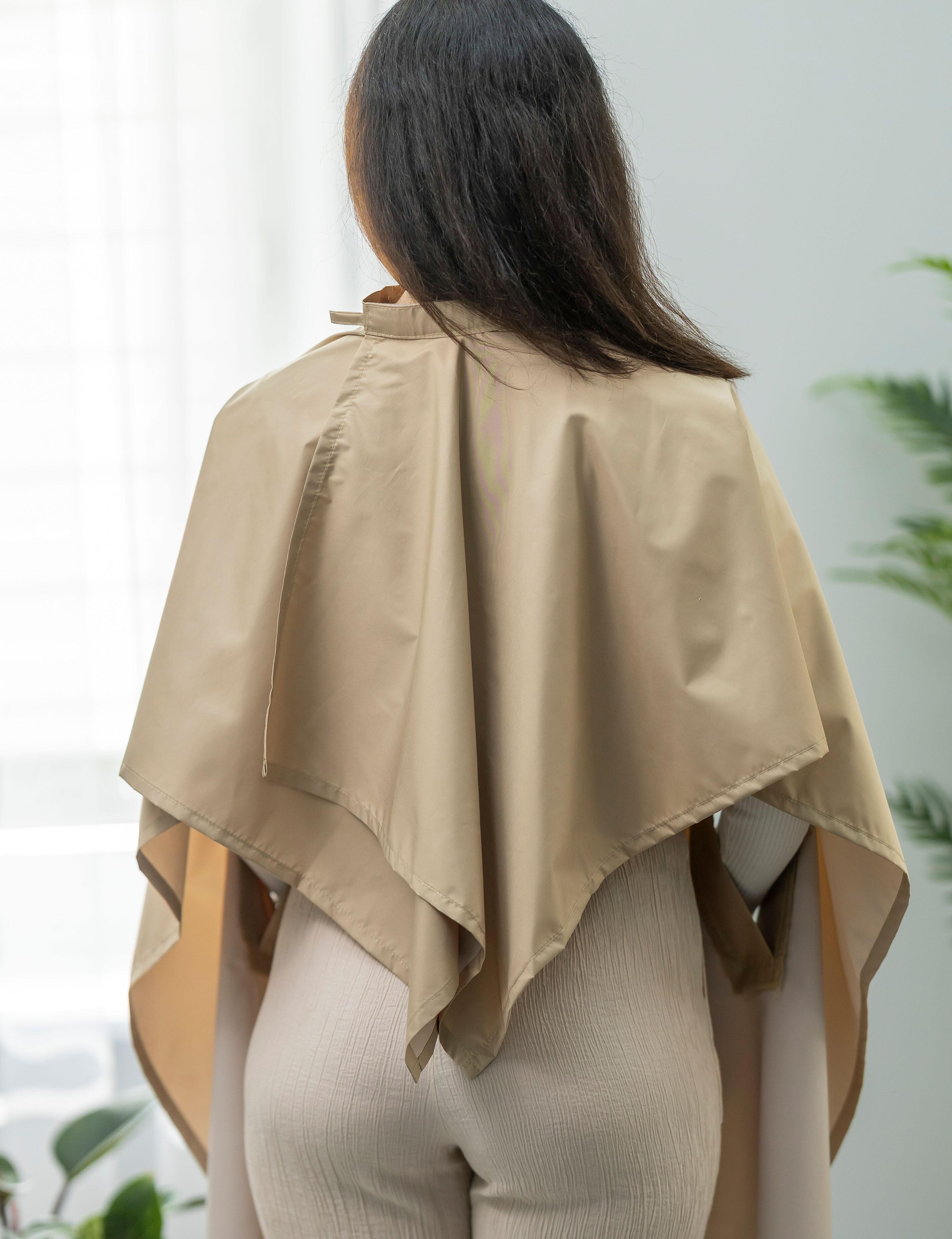 Elegant cappuccino hairdressing cape with slits for USA salons