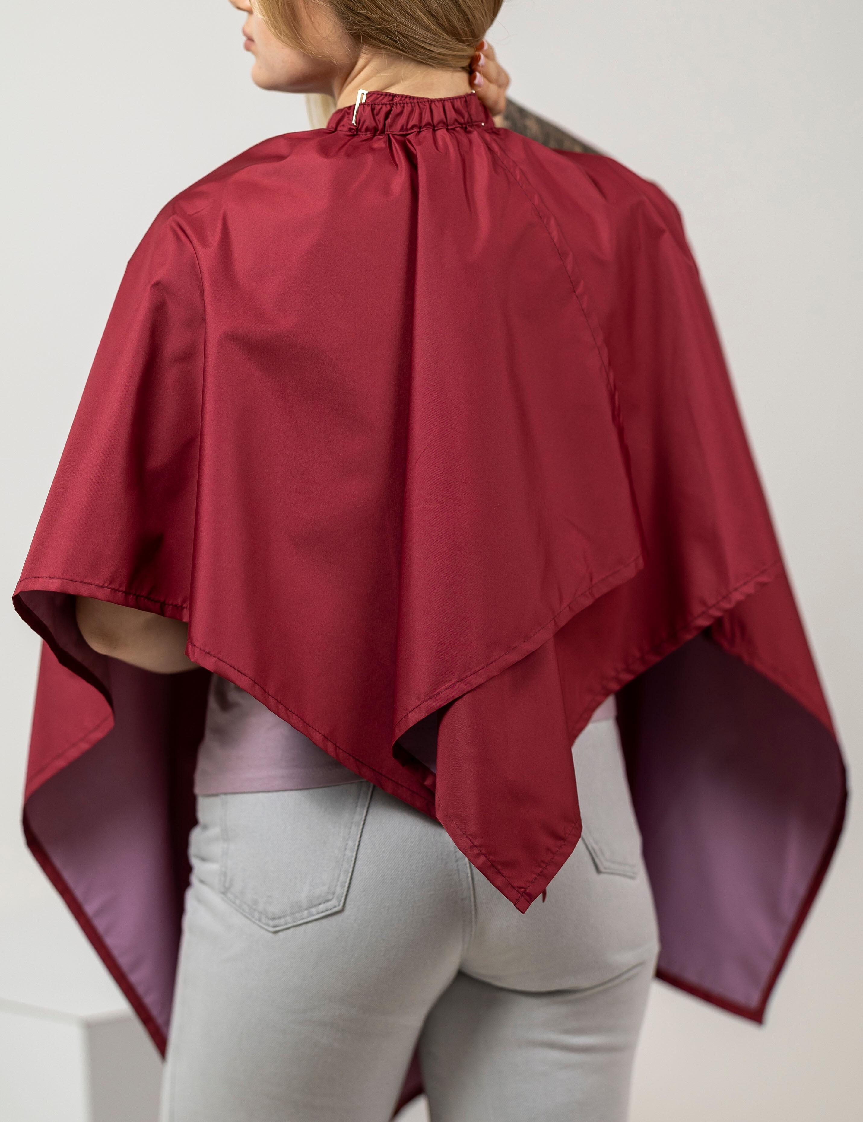 Stain-resistant burgundy barber cape to keep clients safe and dry during hair service