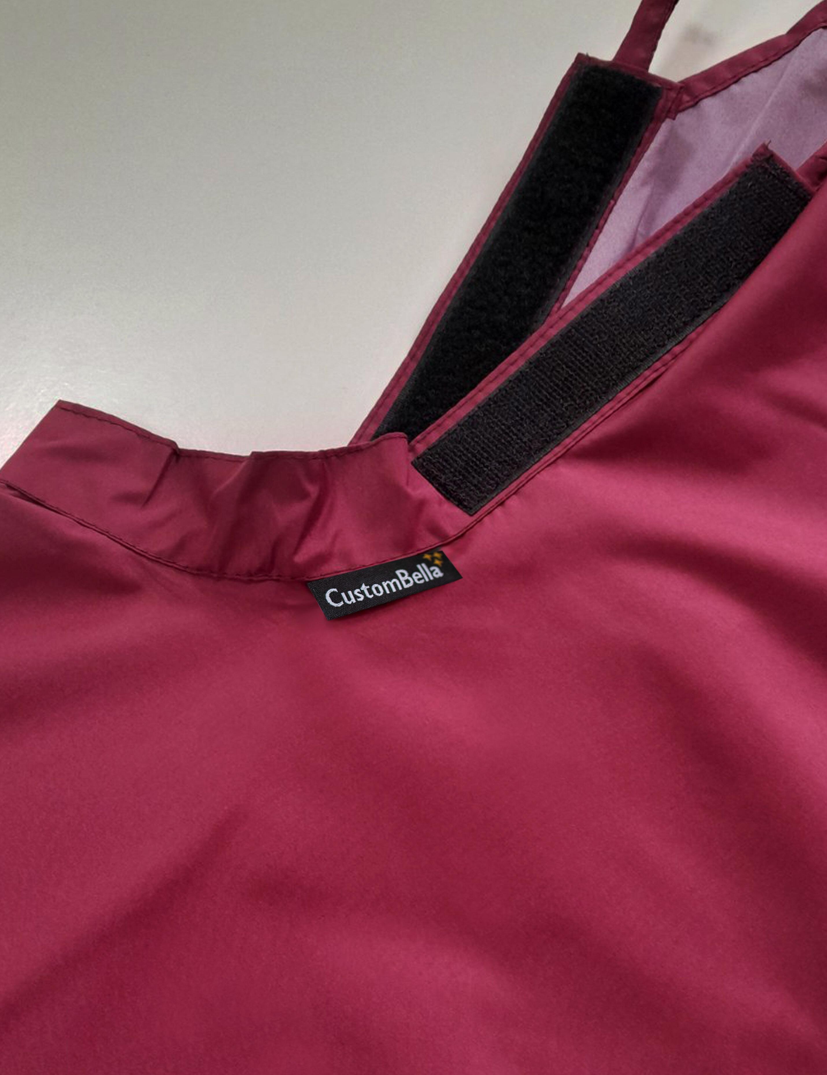 Burgundy kids salon cape with adjustable velcro neck closure