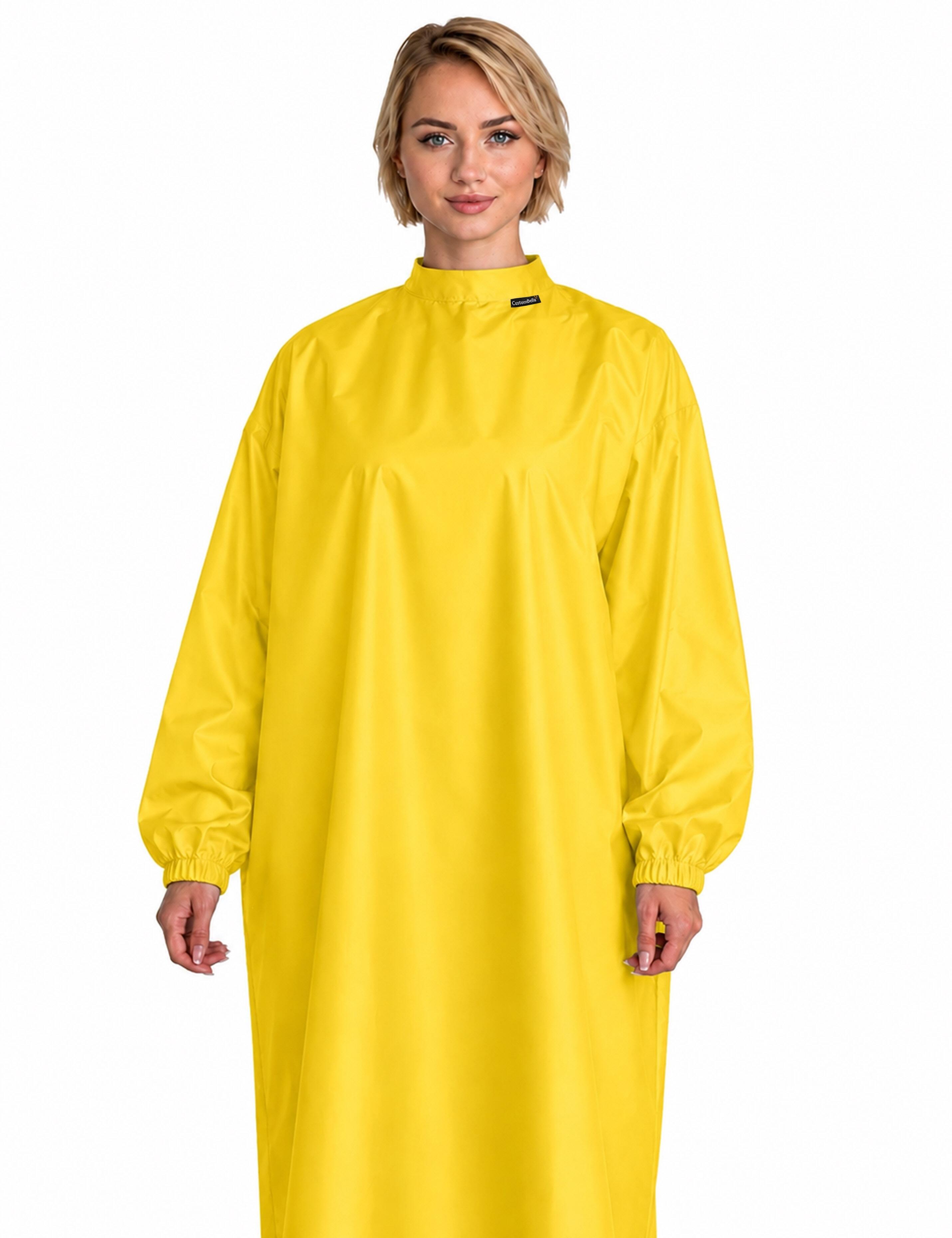 Professional yellow cutting cape with sleeves engineered with advanced BellShield salon protection fabric