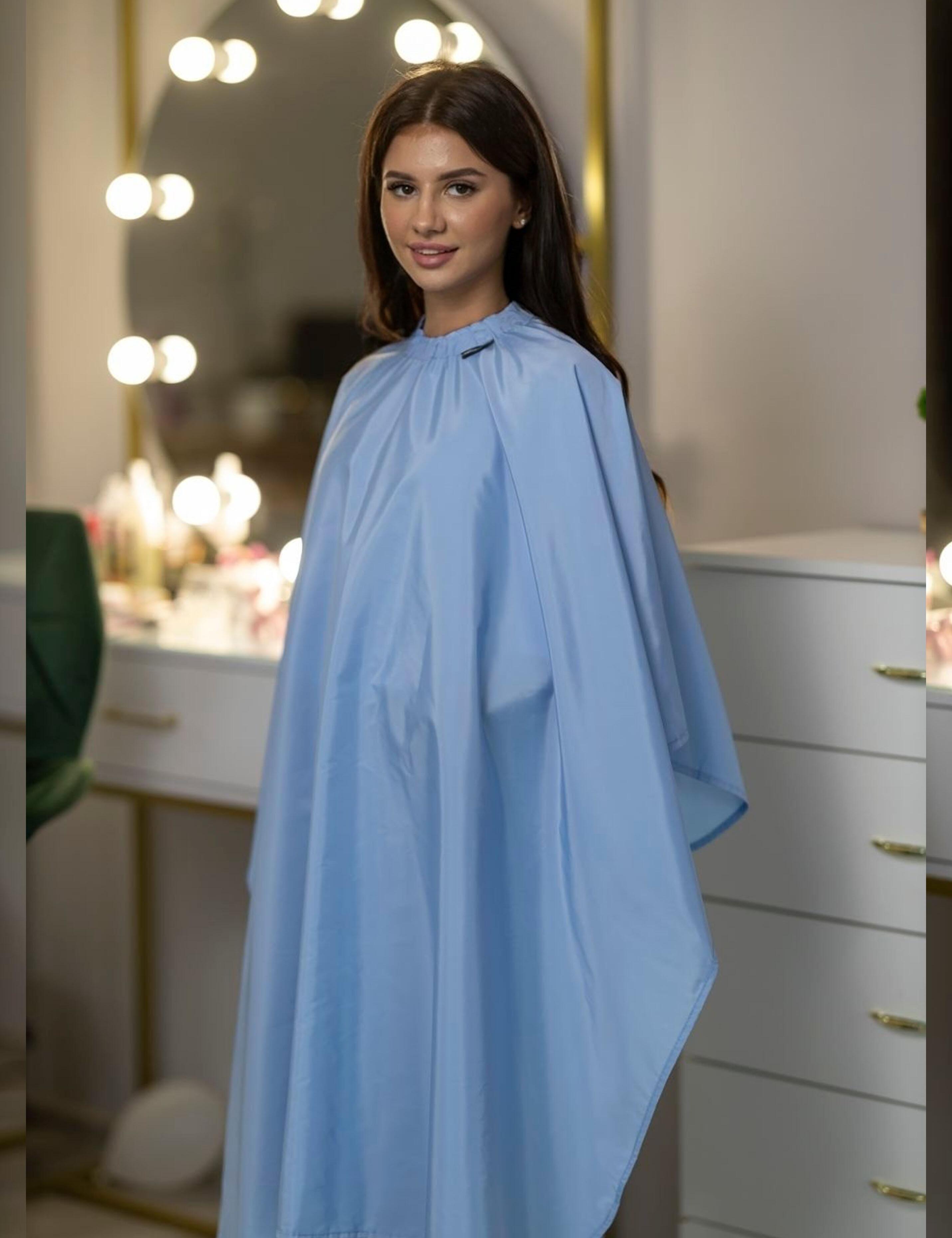 Full-coverage light blue styling cape designed for ultimate client service.