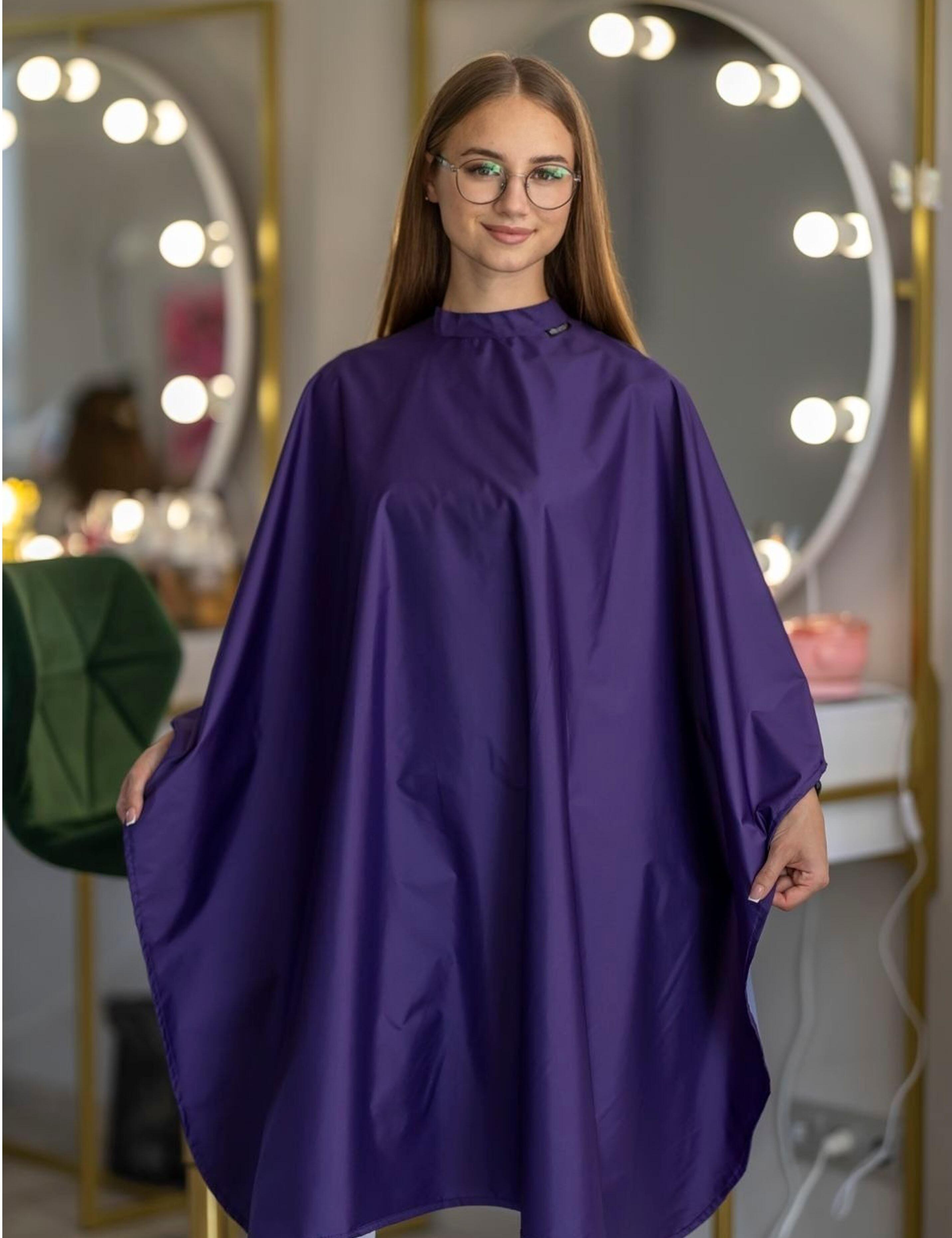 Trendy purple barber cape designed to elevate bold US hair salons.