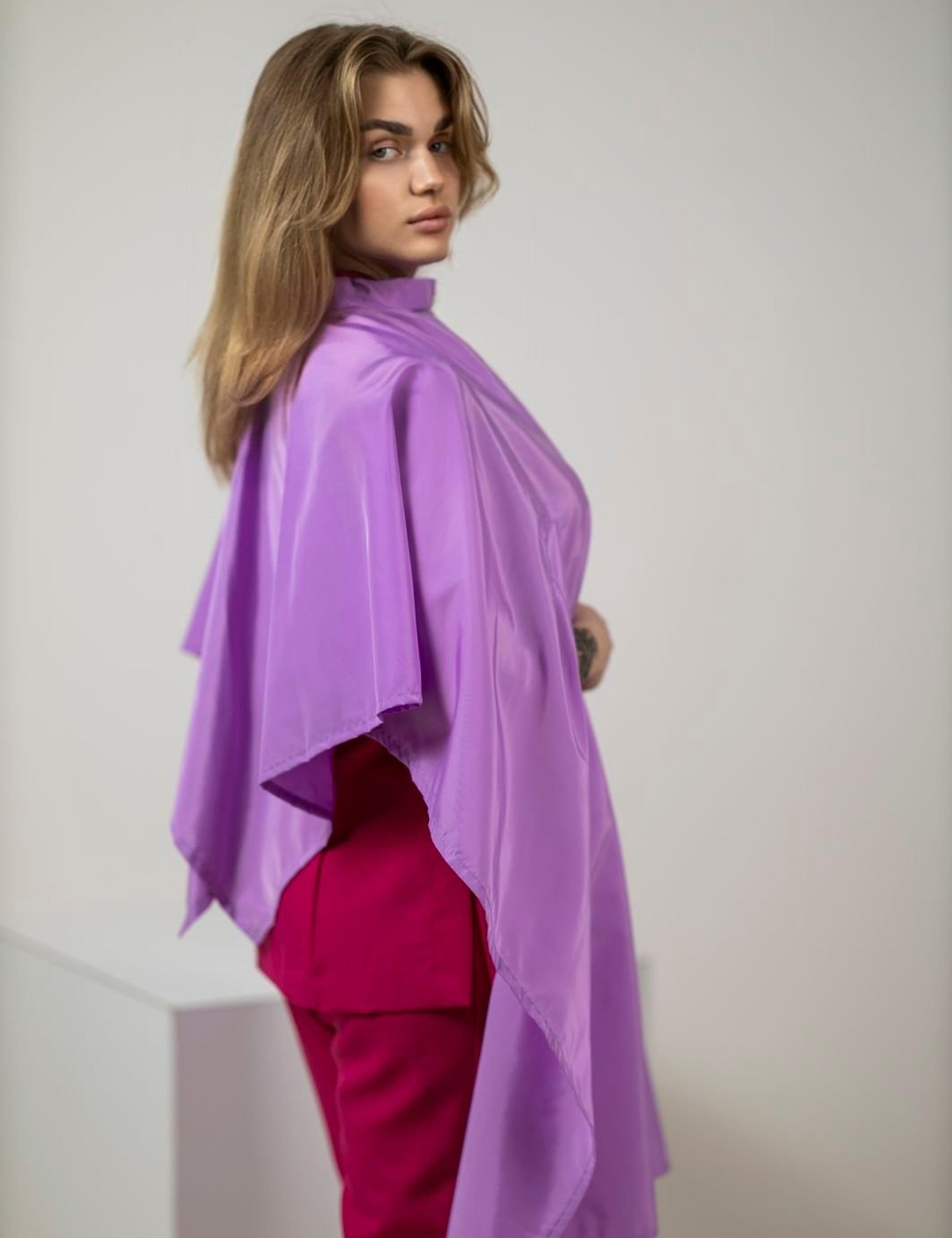 Stylish lilac salon gown with slits for client hands